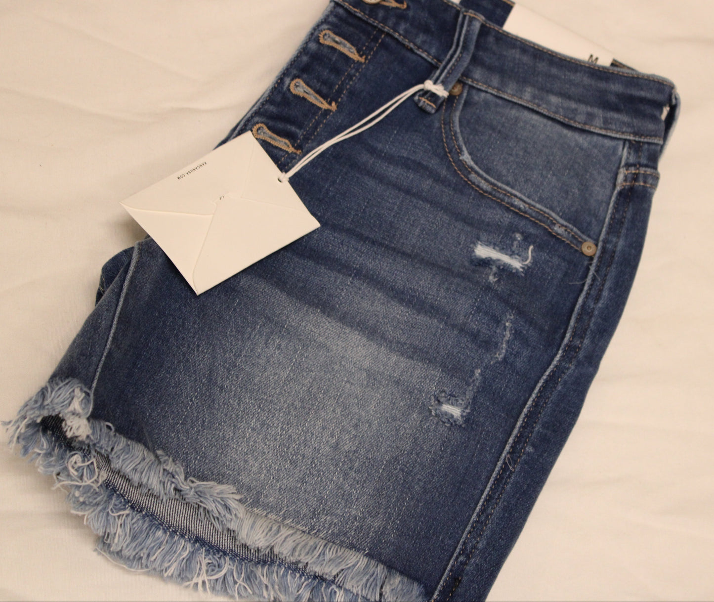 KANCAN MEDIUM RISE SHORTS